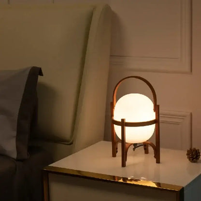 Modern bamboo led desk lamp with warm-toned spherical white glass globe and wooden frame for brass bedroom decorbites bamboo led
