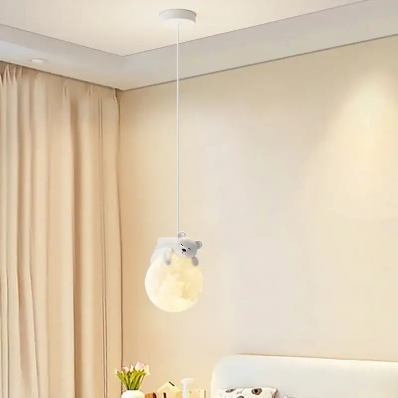 Modern bear led pendant light features a soft gray plush bear hugging a glowing moon for bedroom decoration