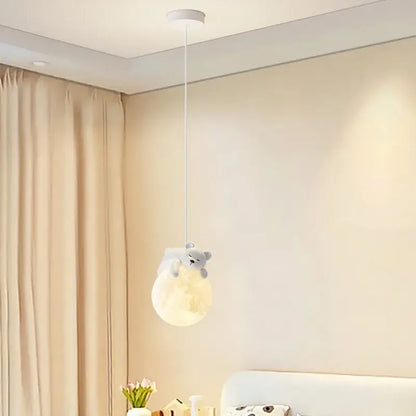 Modern bear led pendant light features a soft gray plush bear hugging a glowing moon for bedroom decoration