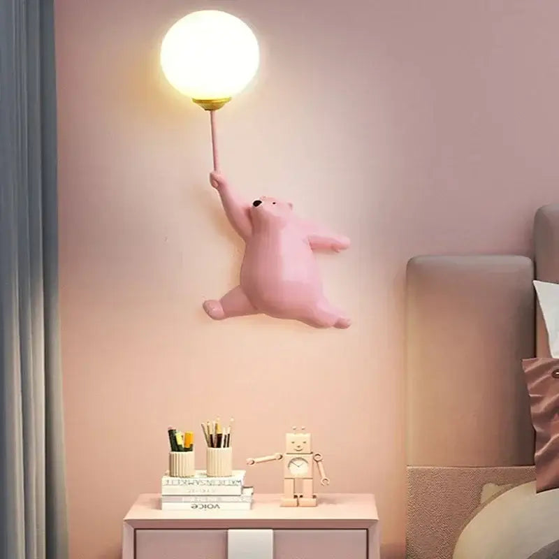 Modern pink bear moon wall lamp with golden base and glowing spherical bulb for kids bedroom decor