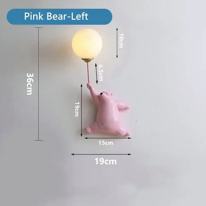 Modern pink bear moon wall lamp with warm-toned glass globe and gold metal stem for kids bedroom decor