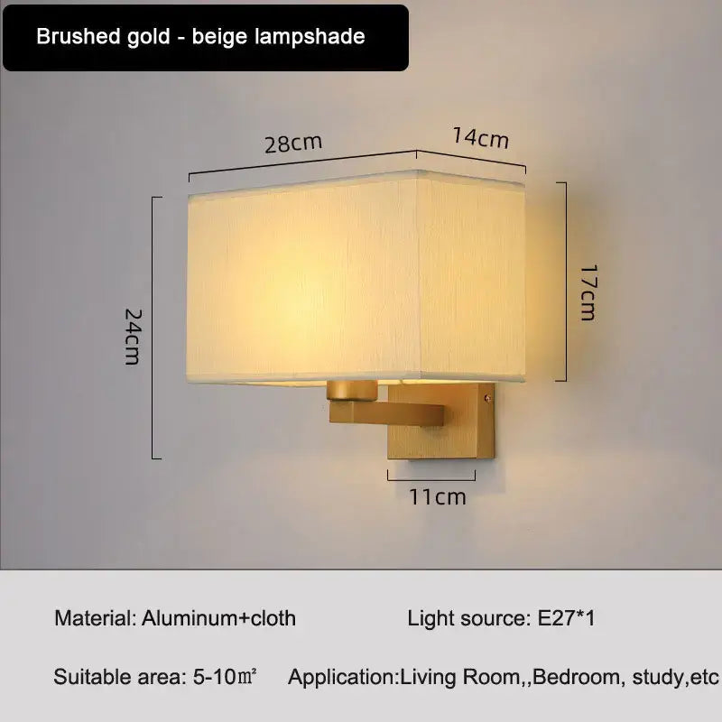 Brushed gold rectangular wall lamp with beige fabric shade for elegant bedroom wall lighting in modern decor