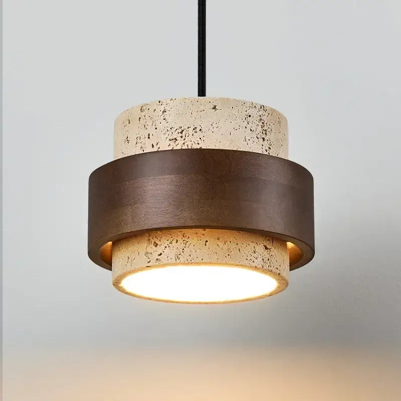 Modern pendant light with textured beige concrete and dark bronze ring, ideal for walnut wood finish dining room