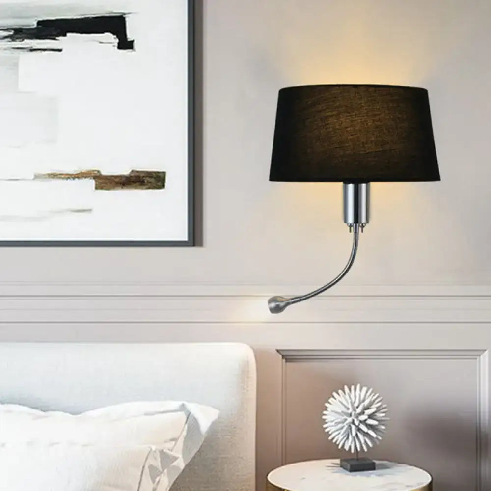 Modern flush wall sconce with black fabric lampshade and chrome-finished arm for bedroom reading light