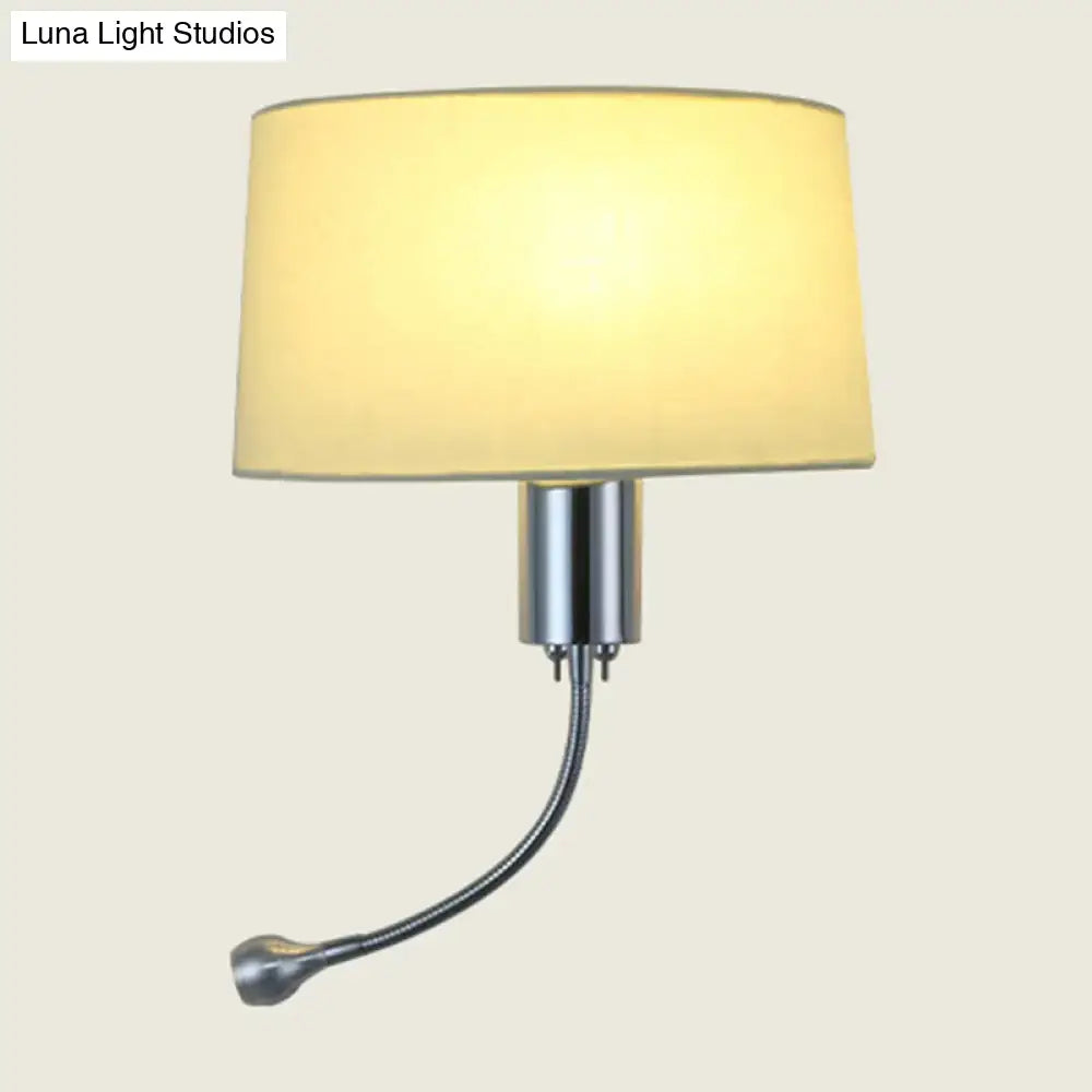 Modern beige fabric flush wall sconce with cylindrical cream shade and flexible chrome gooseneck arm for reading light