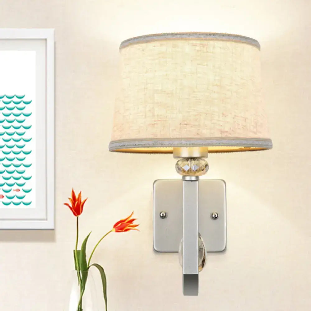 Modern beige fabric wall sconce with crystal accent and silver trim direct wired electric e26 e27 bulb for bedroom lighting