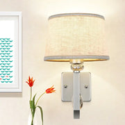 Modern beige fabric wall sconce with crystal accent and silver trim direct wired electric e26 e27 bulb for bedroom lighting