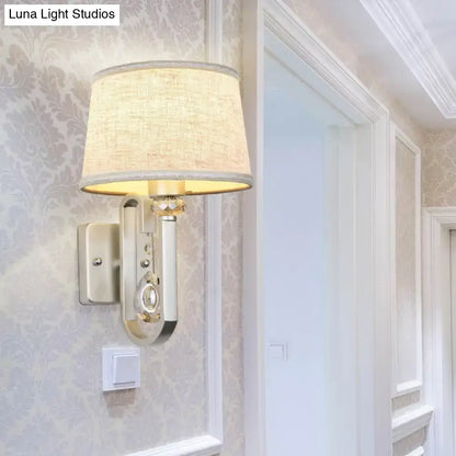 Modern beige fabric wall sconce with crystal accent, silver-toned direct wired electric fixture for e26 e27 bulb use