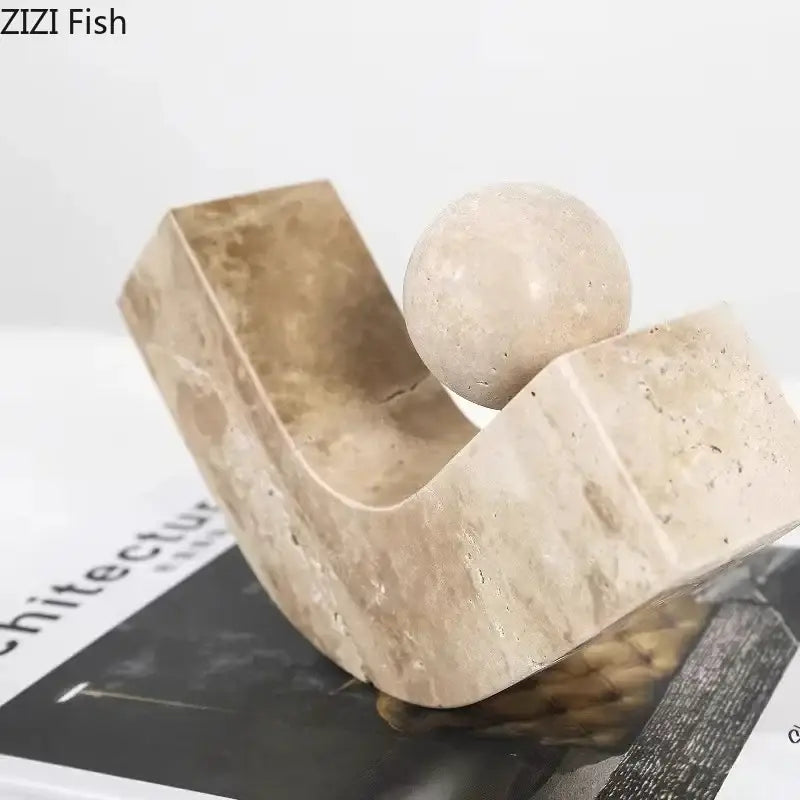 Modern beige geometric stone sculpture with curved base and smooth sphere, perfect as a desk decoration by decorbites