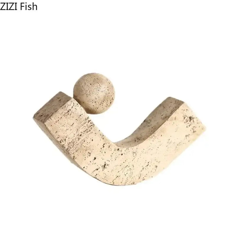 Modern beige geometric stone sculpture with curved base and speckled sphere ideal for desk decoration decorbites geometric stone