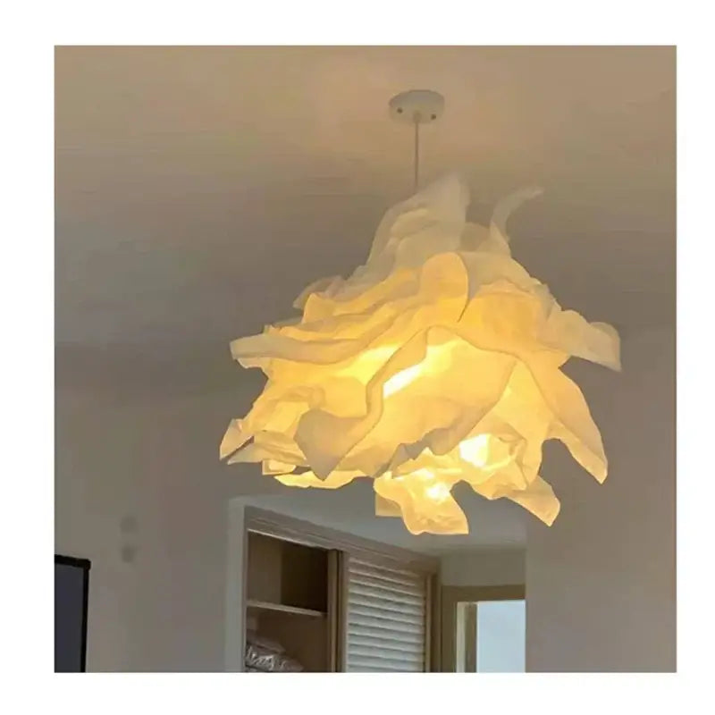 A warm glowing beige and gray nordic paper pendant light with layered translucent petals for living room decorbites nordic paper