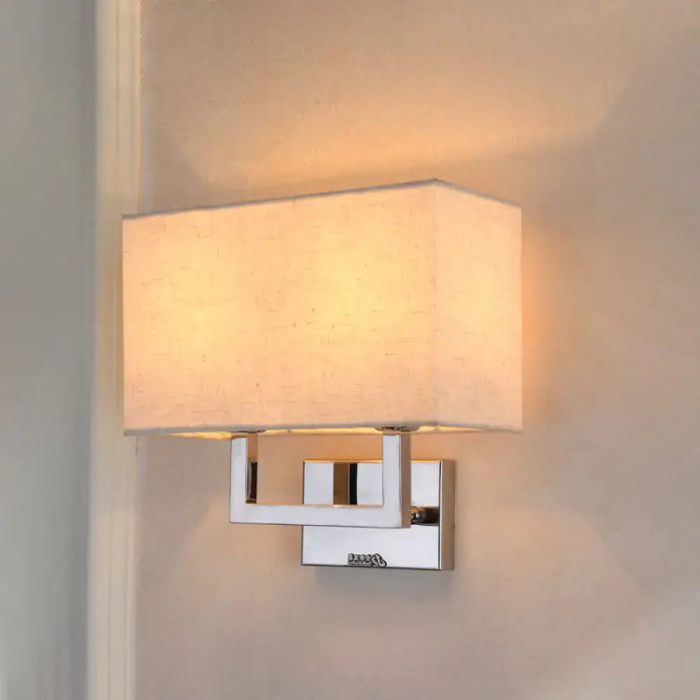 Modern beige rectangular wall sconce with linen shade and polished chrome frame suitable for 110v-120v use