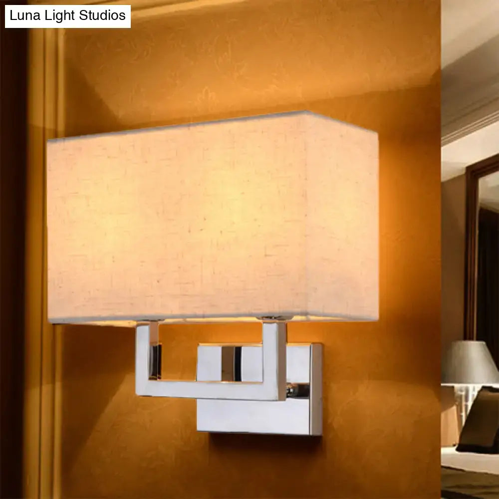 Modern beige rectangular wall sconce with linen shade and polished chrome frame for 110v-120v bedroom lighting