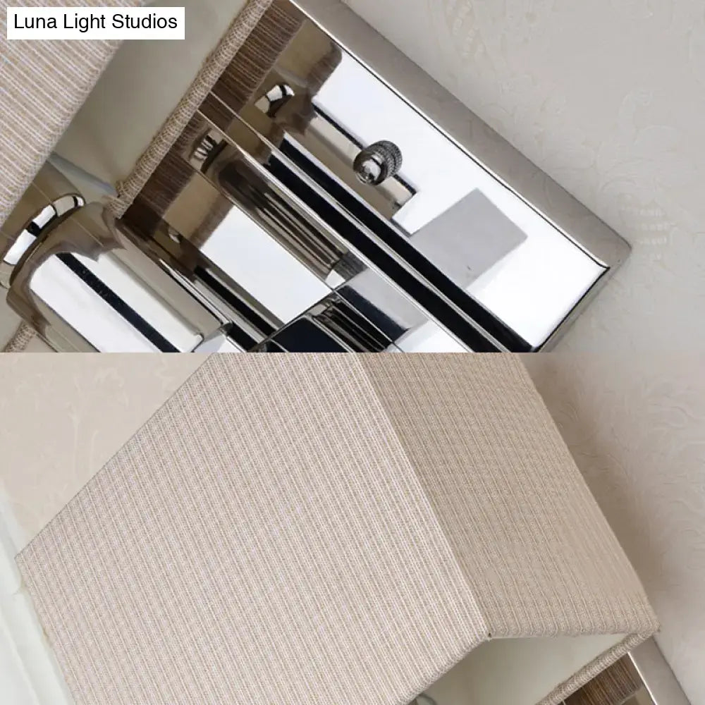 Modern beige ribbed fabric wall sconce with chrome rectangular frame and textured shade suitable for 110v-120v use