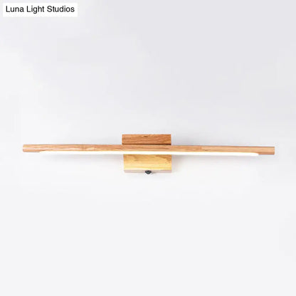 Modern beige stick shaped led vanity sconce with sleek wooden design and natural wood finish for bedroom wall light
