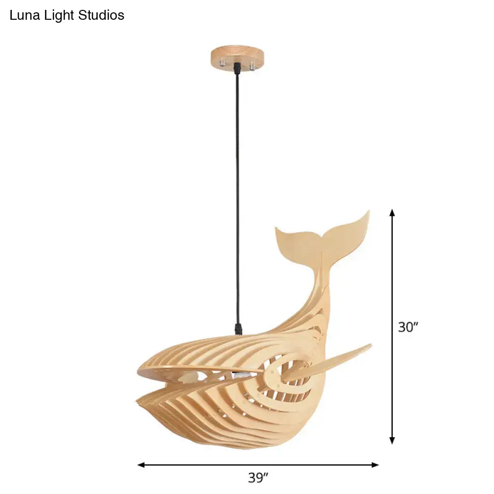 Modern hanging light featuring a light beige wooden whale kids pendant lamp with sleek skeletal design and cut-out patterns