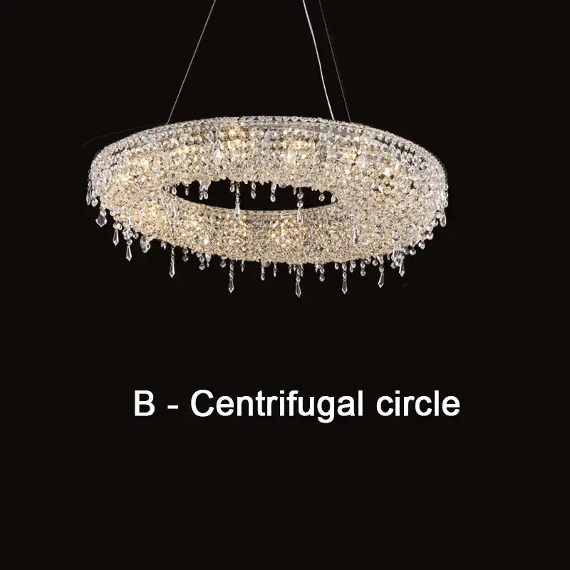 Modern bird nest crystal pendant chandelier with circular design and teardrop crystals illuminated by warm lights decorbites bird nest