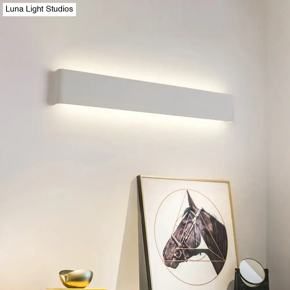 Modern black 12 inch led vanity wall sconce with a sleek minimalist white rectangular design for bathroom vanity wall use
