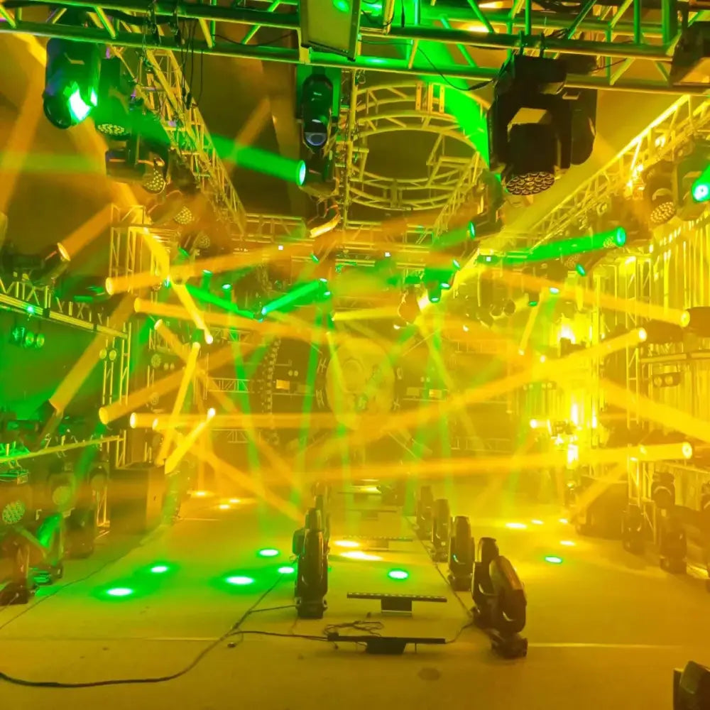 A modern black 150w led moving head light with vibrant green and yellow laser beams for stage and living room decor