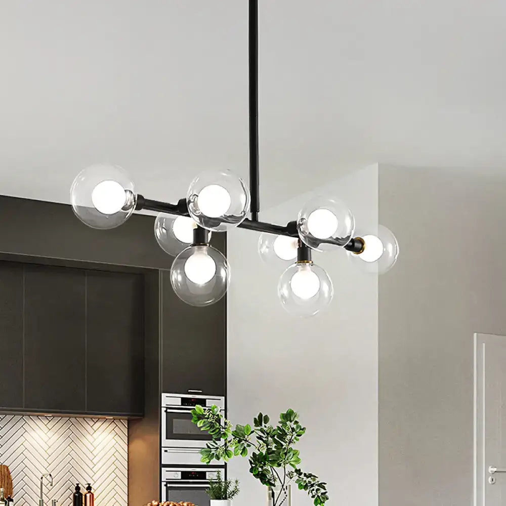 Modern black 8-head kitchen chandelier with clear glass shade and black metal light kit featuring globe bulbs