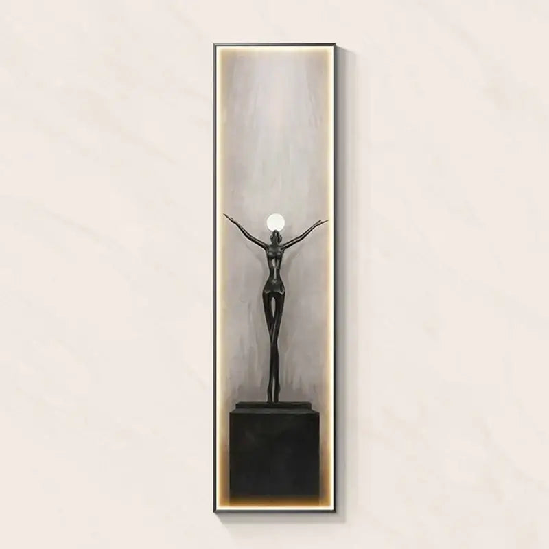 Modern black abstract art led wall lamp featuring a metallic figure holding a glowing orb for living room decorbites decor