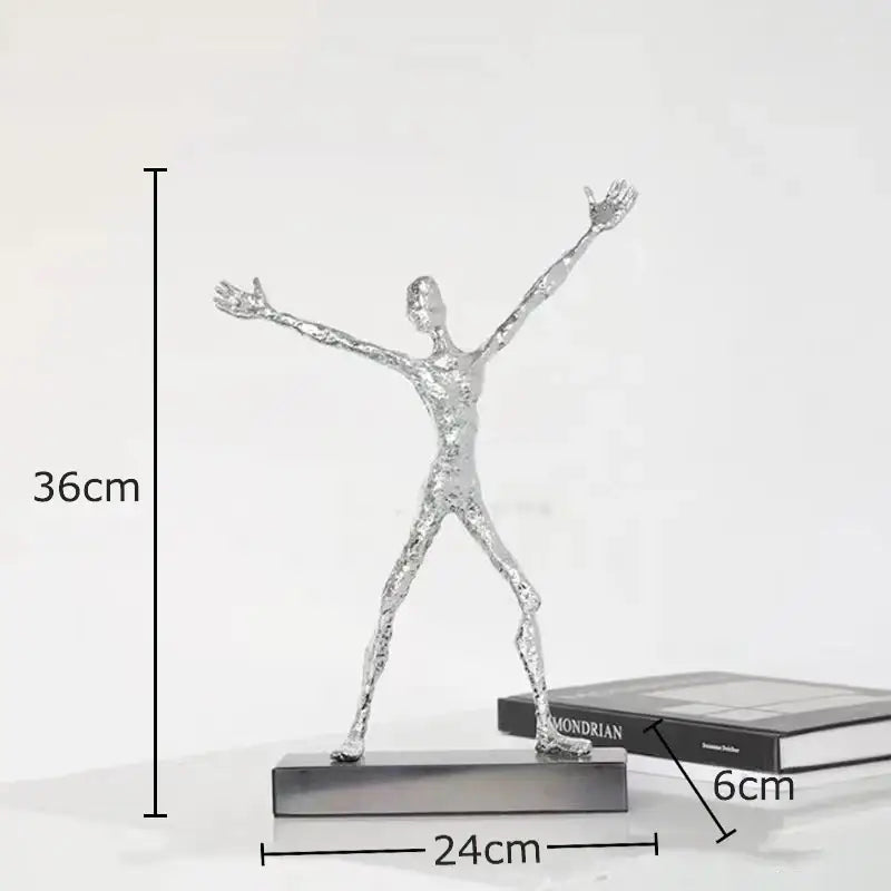 Silver metallic abstract lovers sculpture with arms outstretched on base as modern lovers sculpture desk ornament