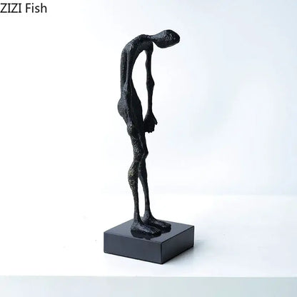 Modern black abstract lovers sculpture desk ornament with elongated textured figurine on matching black base