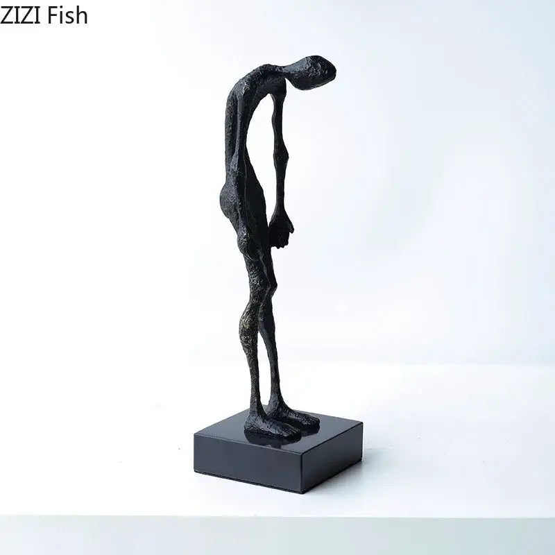 Modern black abstract lovers sculpture desk ornament with elongated textured figurine on matching black base