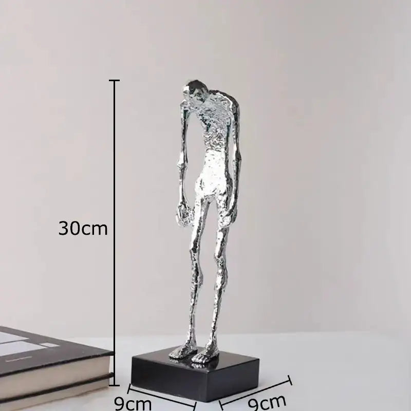 Silver textured abstract lovers sculpture desk ornament of a slender hunched humanoid on a black base for bedroom decor