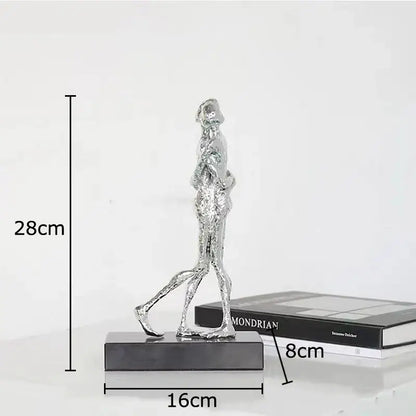 Silver metallic abstract lovers sculpture on a black base modern sculpture desk ornament for bedroom decor