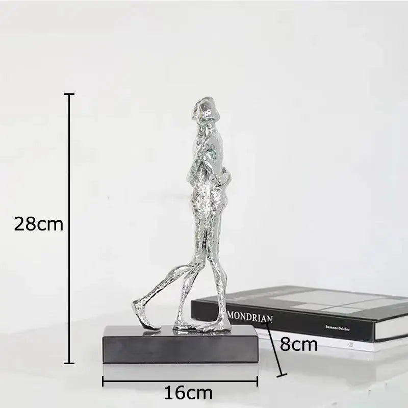 Silver metallic abstract lovers sculpture on a black base modern sculpture desk ornament for bedroom decor