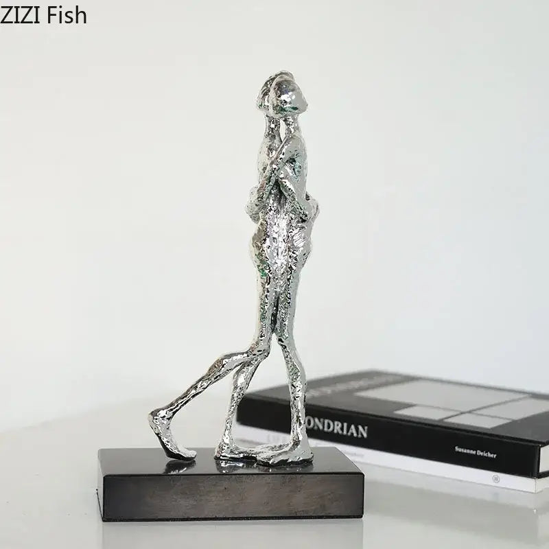 Silver textured abstract lovers sculpture desk ornament on black base for modern bedroom decor