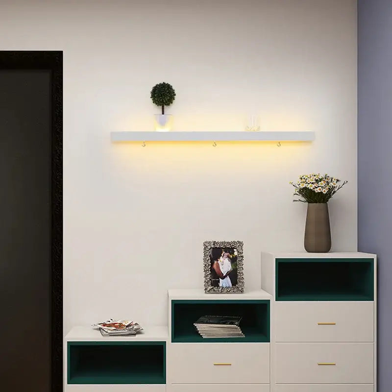 White floating shelf with integrated led lighting and three hooks from decorbites acrylic led wall lamps collection