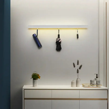 White wall-mounted acrylic led wall lamp with integrated led strip lighting and three hanging hooks for bedroom decorbites acrylic led