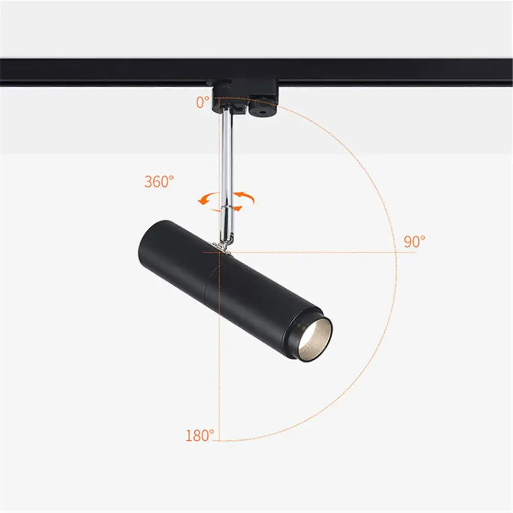 Modern black adjustable focus track lights with cylindrical design offering angle and rotation flexibility for commercial use