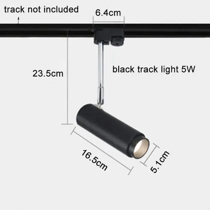 Modern black adjustable focus track lights with matte finish and metallic mounting arm for commercial gallery use by decorbites adjustable focus