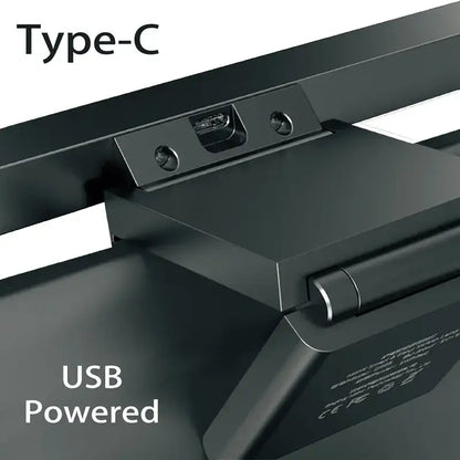 Black matte usb-c charging port on the back of a modern black aluminium monitor light bar for office eye care