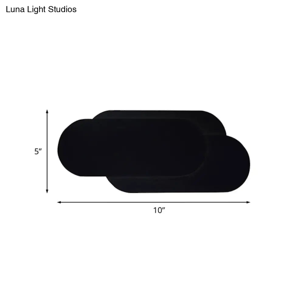 Modern black aluminum oval wall washer lamp shaped like a cloud measuring 10 inches wide and 5 inches tall