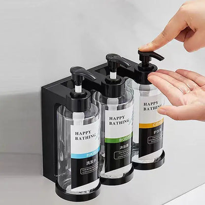 Modern black amber soap dispenser set wall-mounted with three clear amber soap dispenser bottles for hair body and conditioner