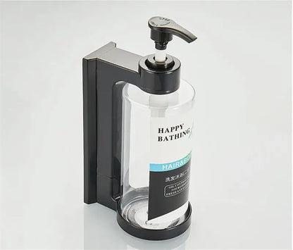 Modern black amber soap dispenser set featuring a wall-mounted black pump and clear glass bottle for bathroom use