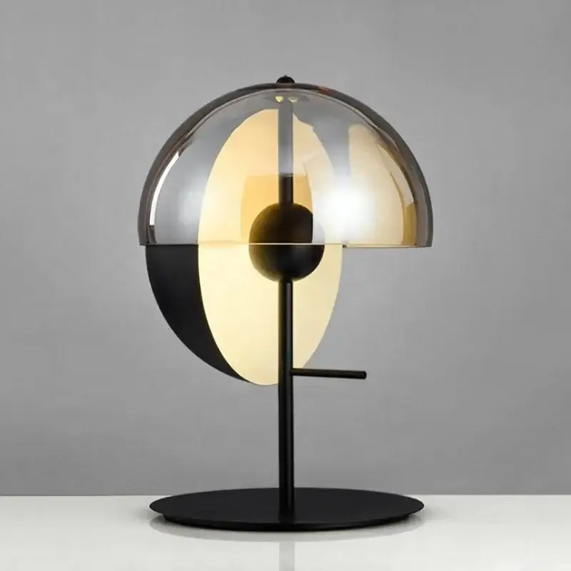 Modern black and amber glass table lamp with translucent amber glass dome and circular base for bedroom decorbites glass table