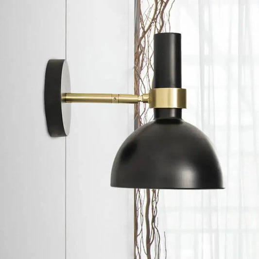 Modern black and brass domed wall lamp with matte finish and brass accent band for bedroom bedside use with led incandescent fluorescent bulbs