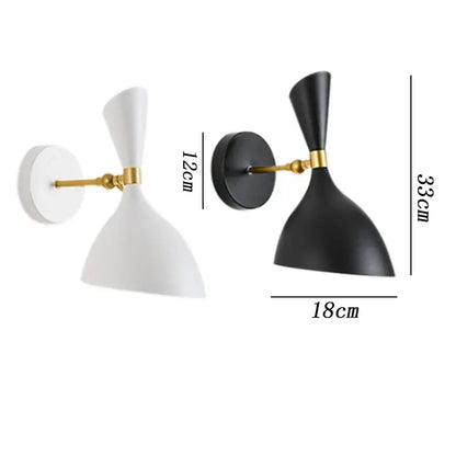 Modern black and brass industrial wall lamp with sleek conical shade in matte black and polished brass hardware decorbites black white