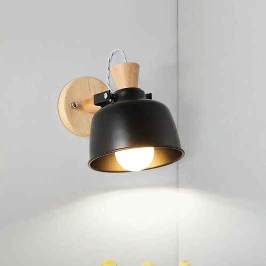 Modern black and brass metal wall light bedroom sconce with adjustable arm wood backplate and brass interior
