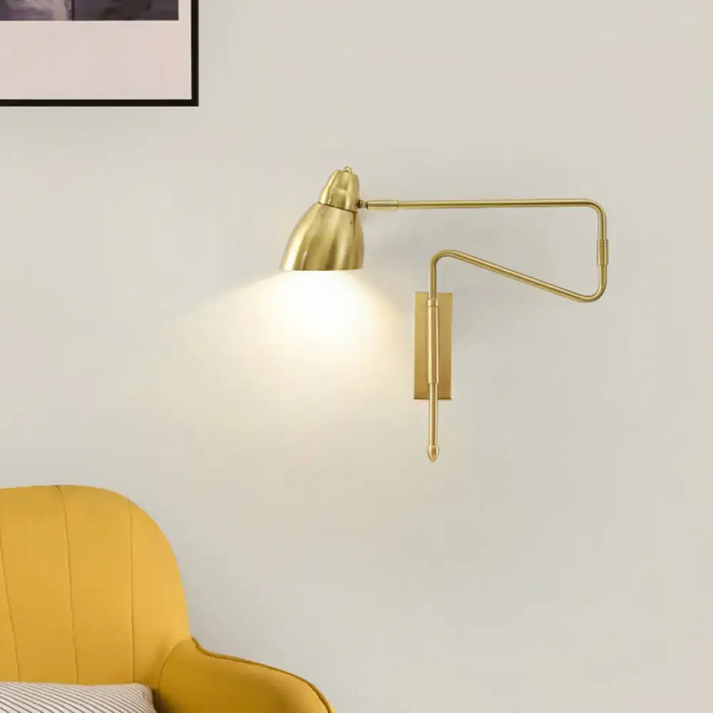Brass-finished adjustable wall light with sleek articulated arm, conical shade, and suitable backplate width for bulb base