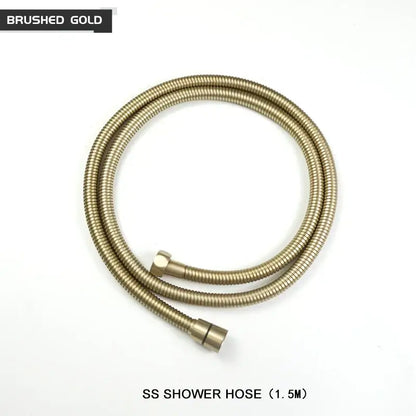 A 1.5-meter stainless steel shower hose with brushed golden finish and ribbed texture for handheld shower head