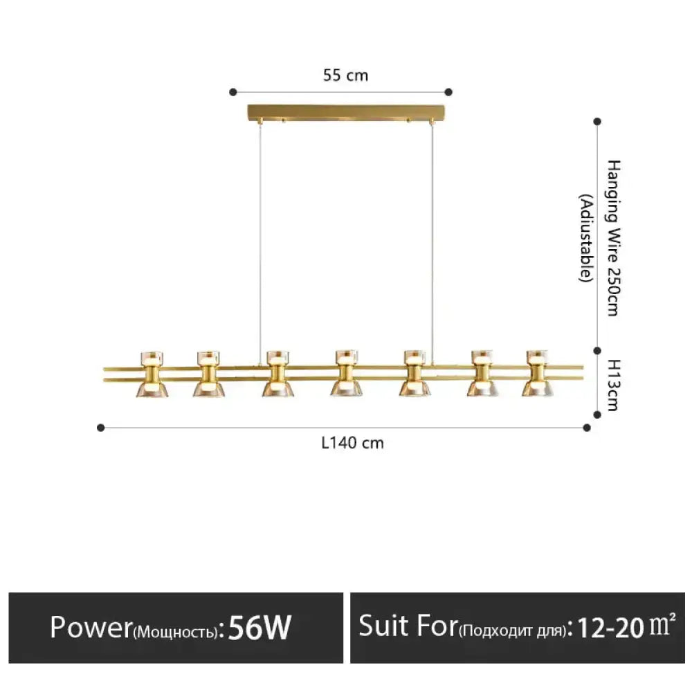Modern gold-toned linear led strip lamp with six integrated lamps and adjustable hanging wire for kitchen island lighting