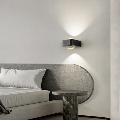 Modern black and copper bedroom wall lamp with frosted glass dome emitting warm light ideal for decorbites copper bedroom decor