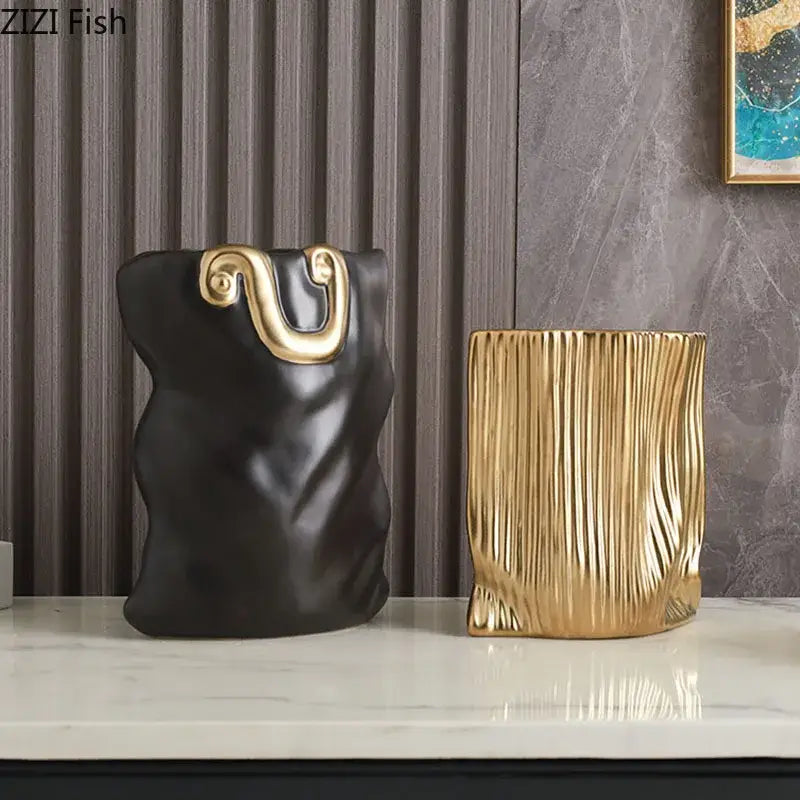 Modern black and gold ceramic bag vase set with textured surface and gold-tone handle for living room decorbites ceramic decor