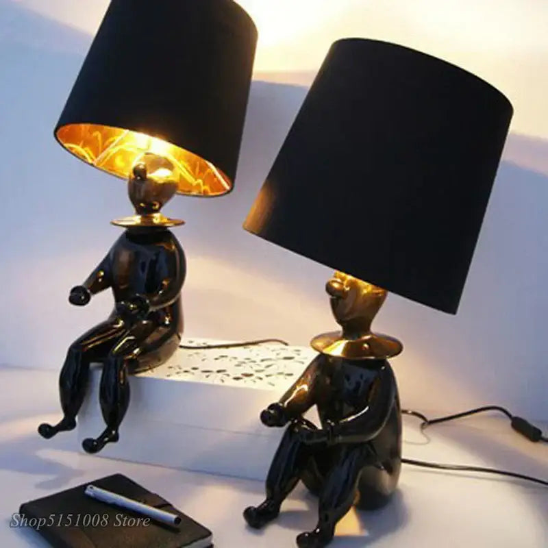 Modern black and gold ceramic clown desk lamp with gold-trimmed lampshades for bedroom decorbites clown desk light